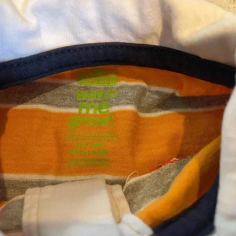 Sesame Street 6-9 months orange striped long sleeve lion shirt and jeans outfit​
